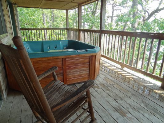 Spend evenings soaking in your own hot tub on the porch. Photo courtesy Mountain Harbor