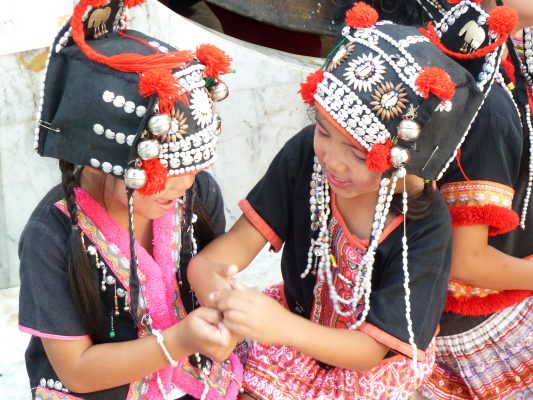 Children playing outside the Wat Prathat Doi Suthep Temple in mountains near Chiang Mai (built 1386)
