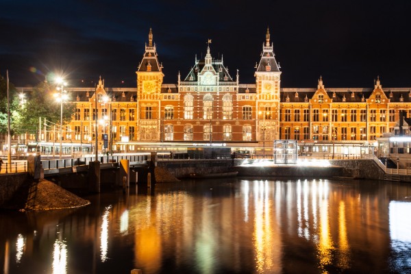 The Amsterdam Central Station is one of the places you can visit during a trip to Amsterdam, capital city of The Netherlands