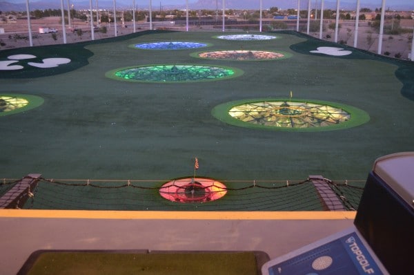 Topgolf putting green at night