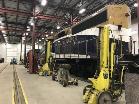 Working on one of the Rocky Mountaineer engines. Photo by Susan Lanier-Graham