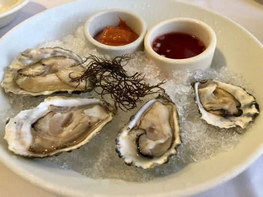 Enjoy fresh oysters at Merriman's Fish House. Photo by Jill Schildhouse