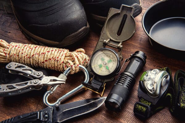 Outdoor travel equipment planning for a camping trip. Photo by chanwity via iStock by Getty Images