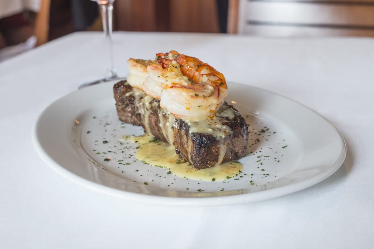 Ocean Prime NY Strip Steak with Garlic Shrimp Scampi. Photo courtesy Ocean Prime Phoenix