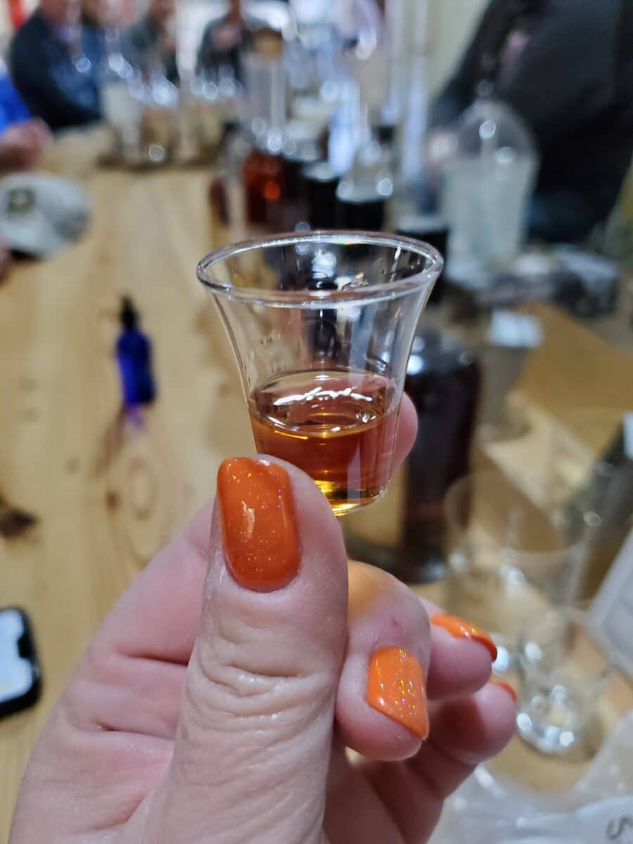 A sip of bourbon in a tiny glass at Glenn's Creek Distillery