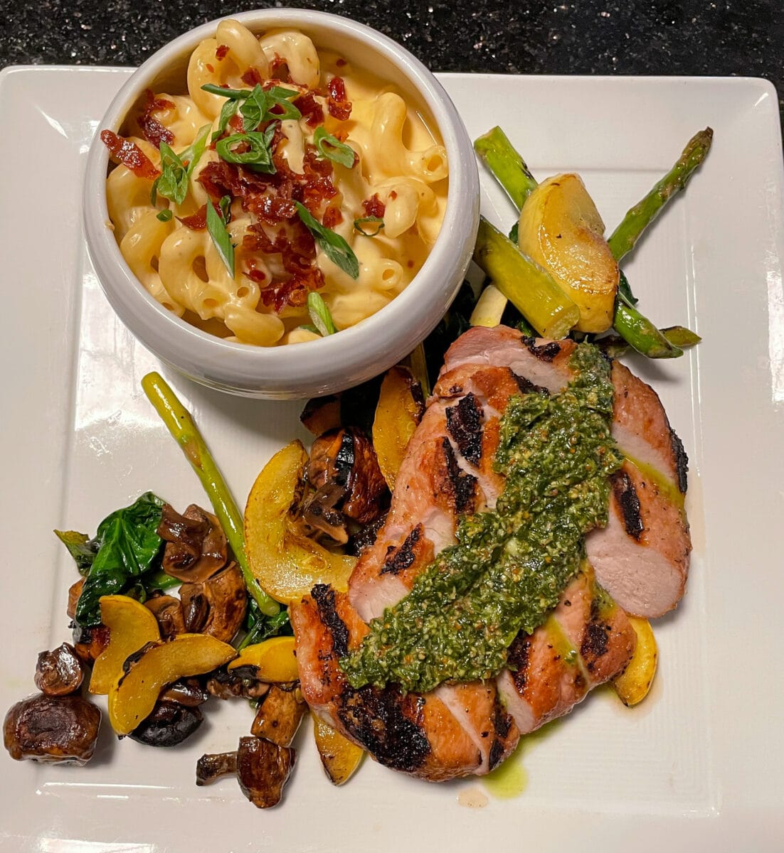 Food plate of smoked pork and macaroni and cheese from The Class Act restaurant