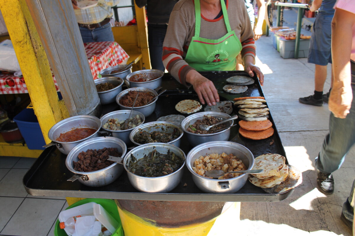 The ladies at the train depot's 'La Cocina' prepare gorditas, stuffed with meats and potatoes.