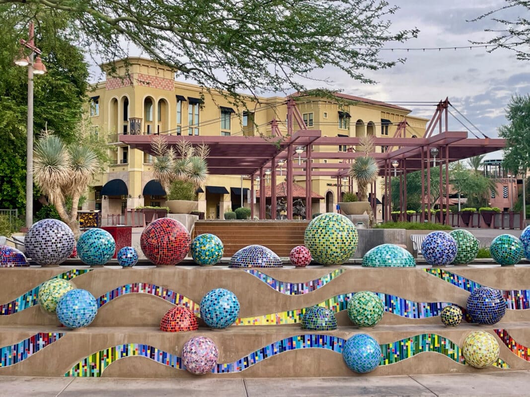 Mosaic wall and sphere with water flowing