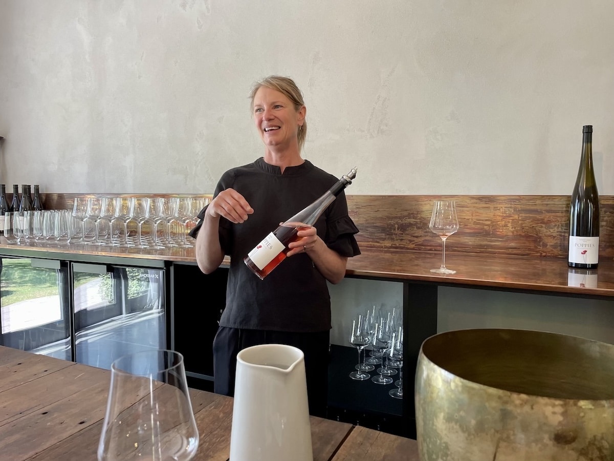 Poppy preps us for a taste of her amazing rose.