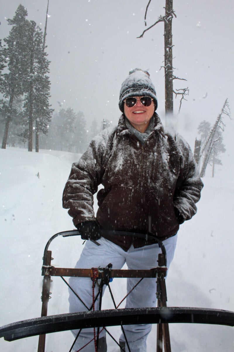 Dress like you're going skiing, especially on snowy days when going dog sledding.