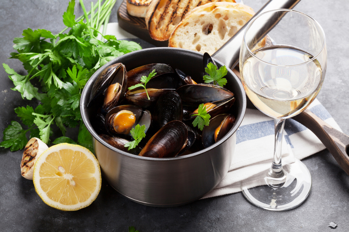 Burgundy Wines: An Introduction to the World of Fine Wine 3 Mussels in copper pot and white wine on stone table
