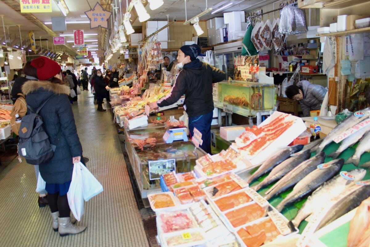 The Hakodate Morning Market Square seafood vendor featured live crab, squid, and scallops with an indoor dining area. I liked the live crabs best.
