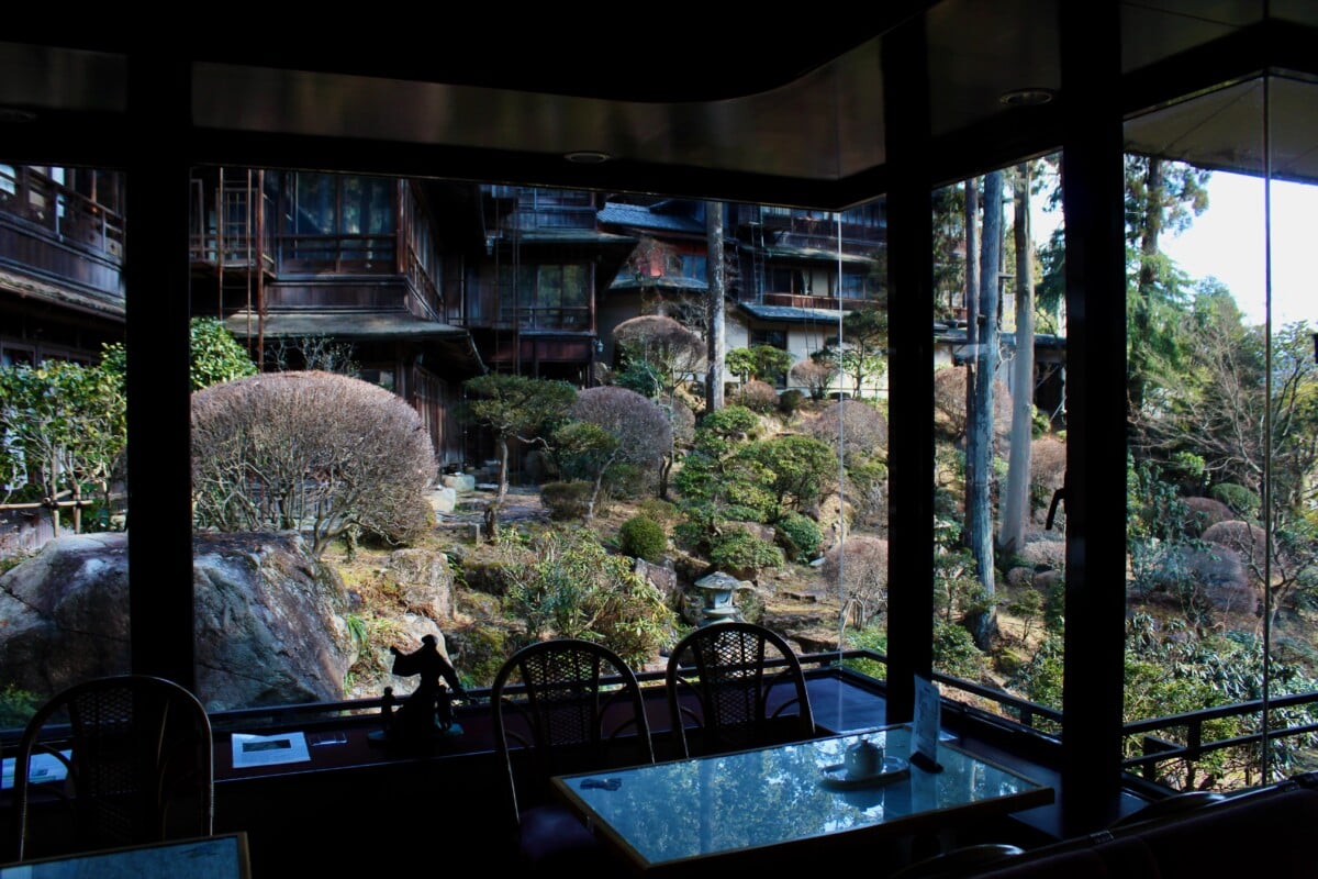 The dining room at Yunoshimakan onsen resort looked out on the steep forested mountainside. A beautiful place on my photo tour of Japan.