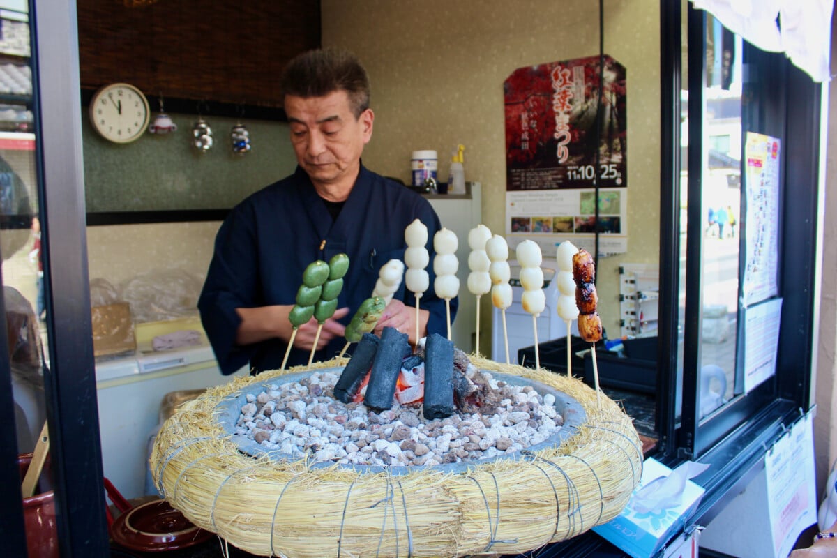 My wife and her mom had stopped to try this street vendor's dango. Not my favorite thing to eat in Japan, but I'll have a bit on most trips A lovely part of my photo trip to Japan.