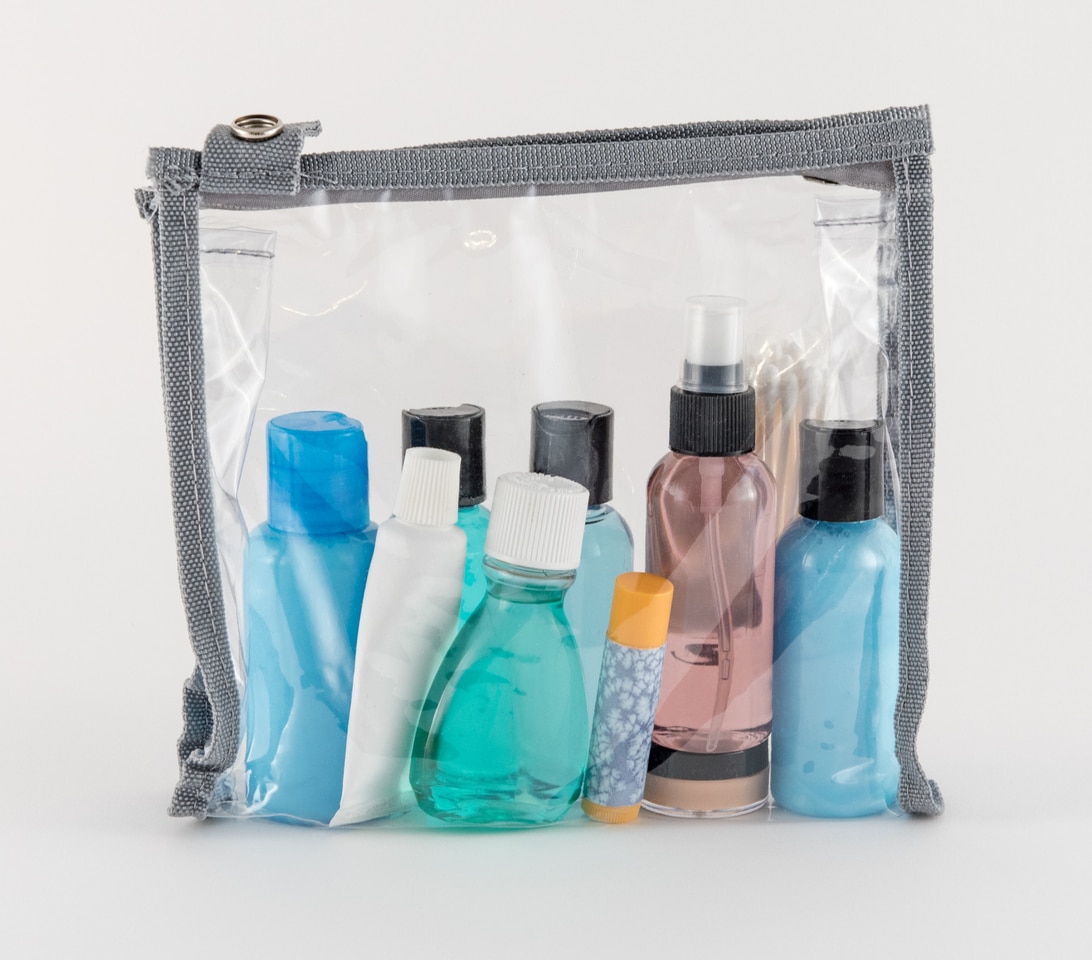 Minimize what you carry by sticking to travel-sized toiletries. Photo by krisblackphotography via iStock by Getty Images