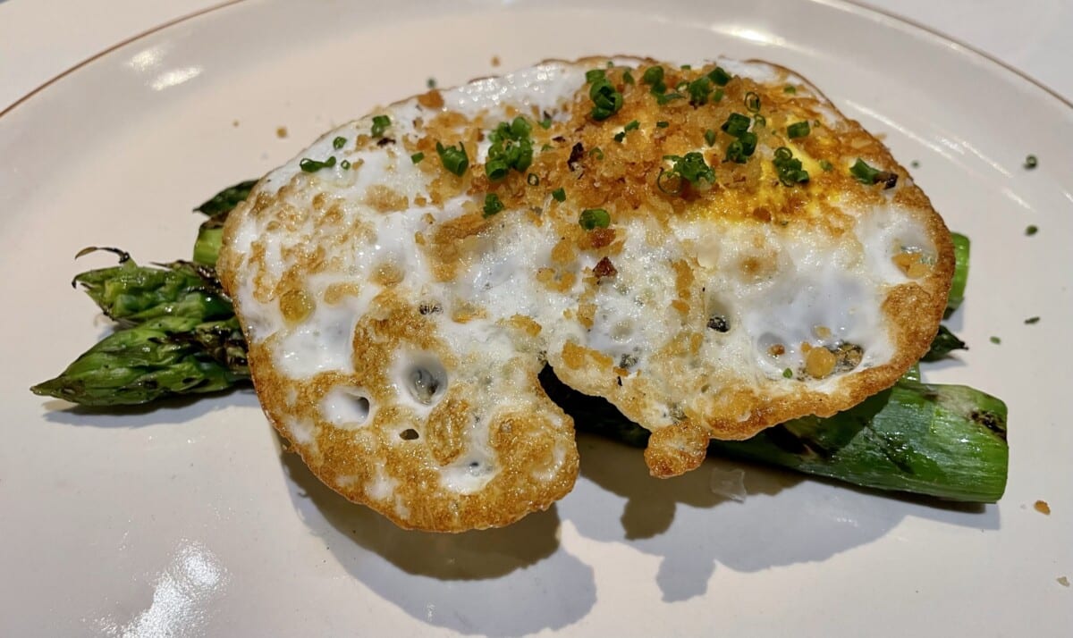 Grilled asparagus with a duck egg.