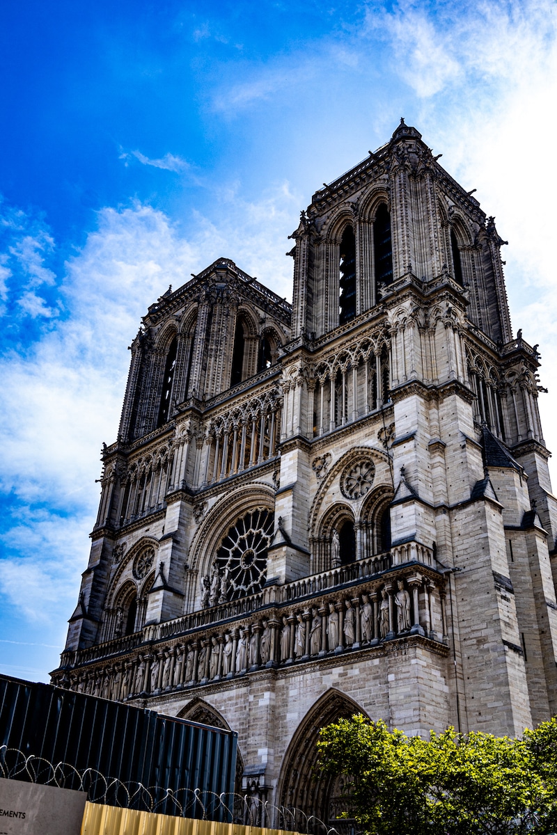 As an American Photographer in Paris, I photographed the bell towers at Cathédrale Notre Dame de Paris, unscathed by fire.