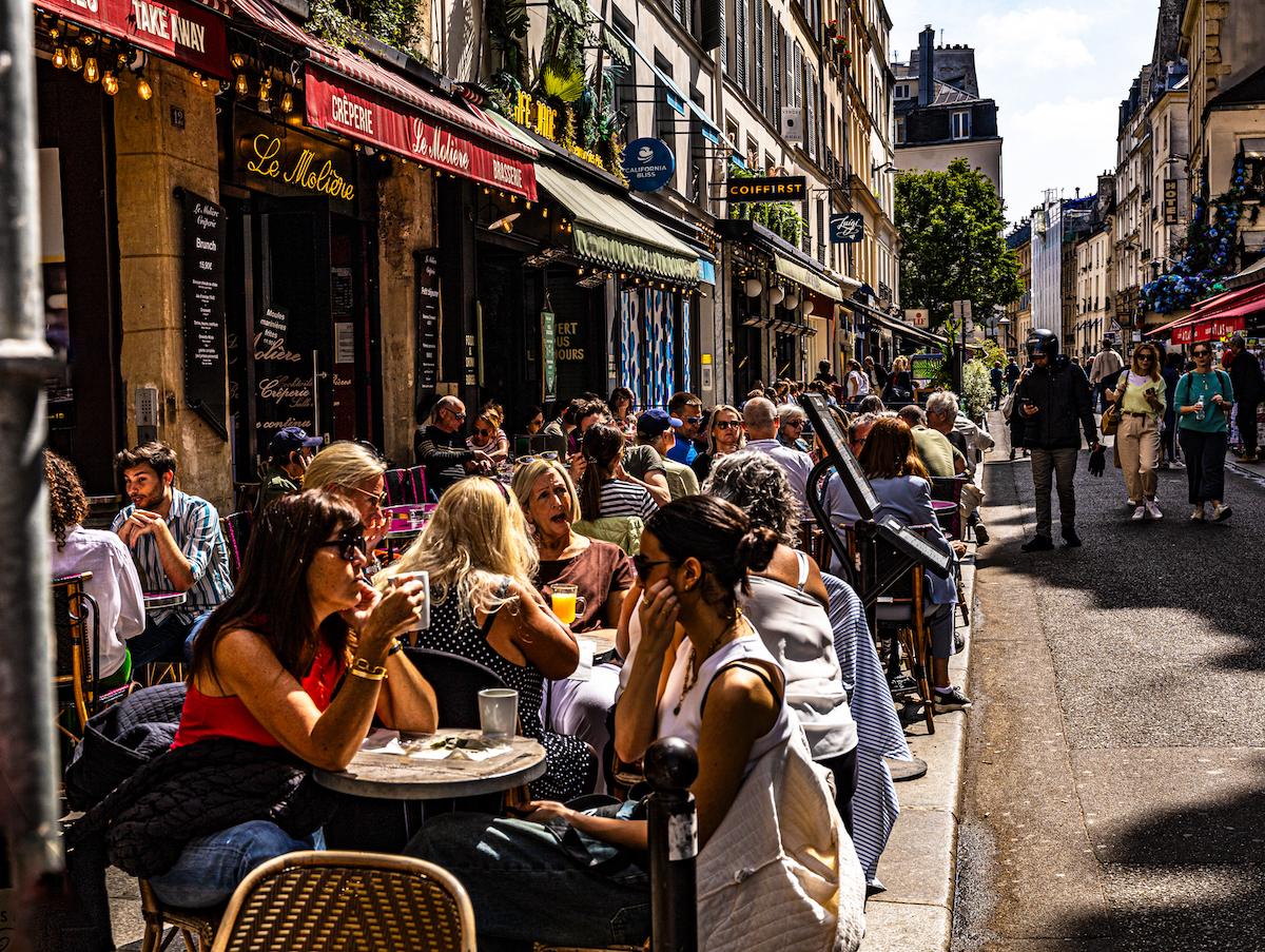 It was imperative as an American photographer in Paris, to capture the bustling sidewalk cafés of Paris are one of its most famous sites. 