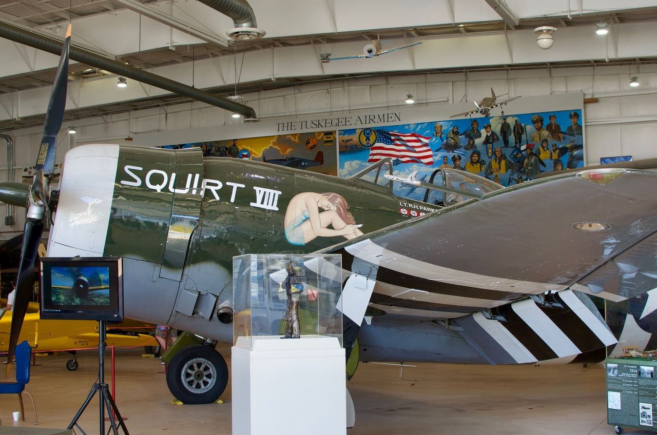A historic plane with a logo Squirt VIIII in the Palm Springs Art Museum