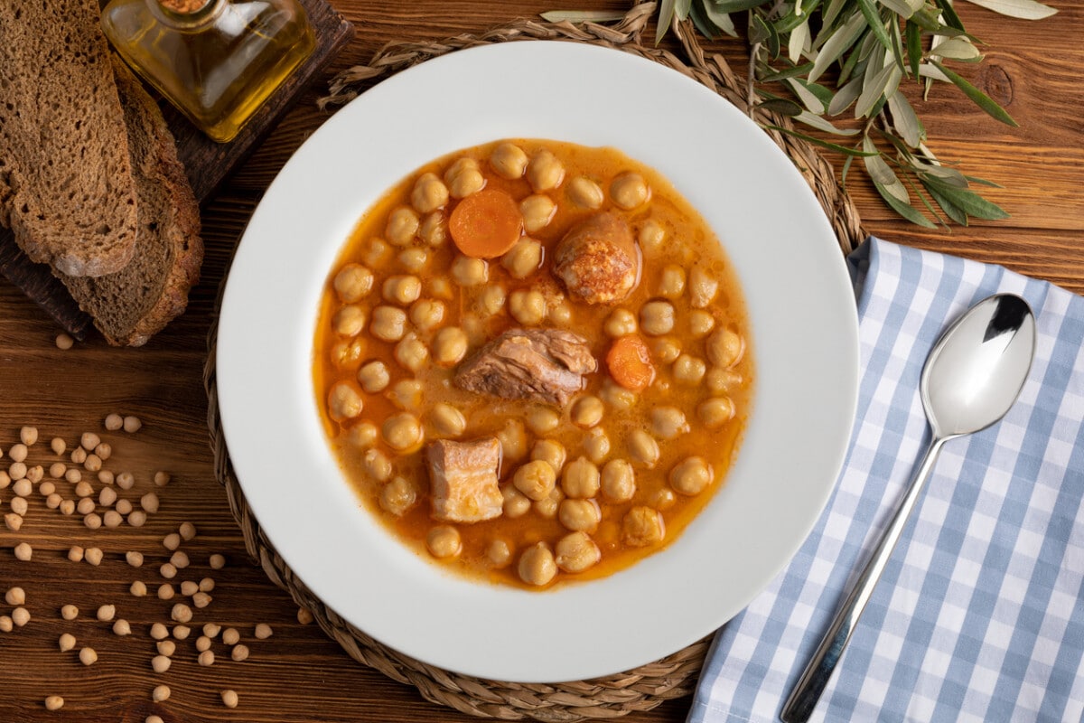 Cocido madrileño, is a famous Madrid chickpea stew dish. Photo by Jose Pedroso Vallejo via iStock by Getty Images