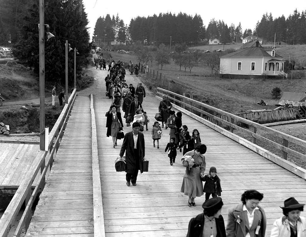 Japanese Americans evacuating Bainbridge Island for internment camps on Marcn 30, 1942. Photo courtesy MOHAI