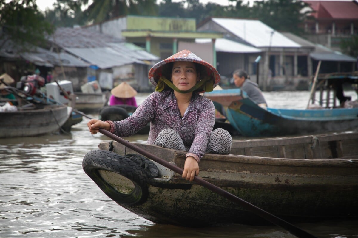 Woman in the floating market in Vietnam
