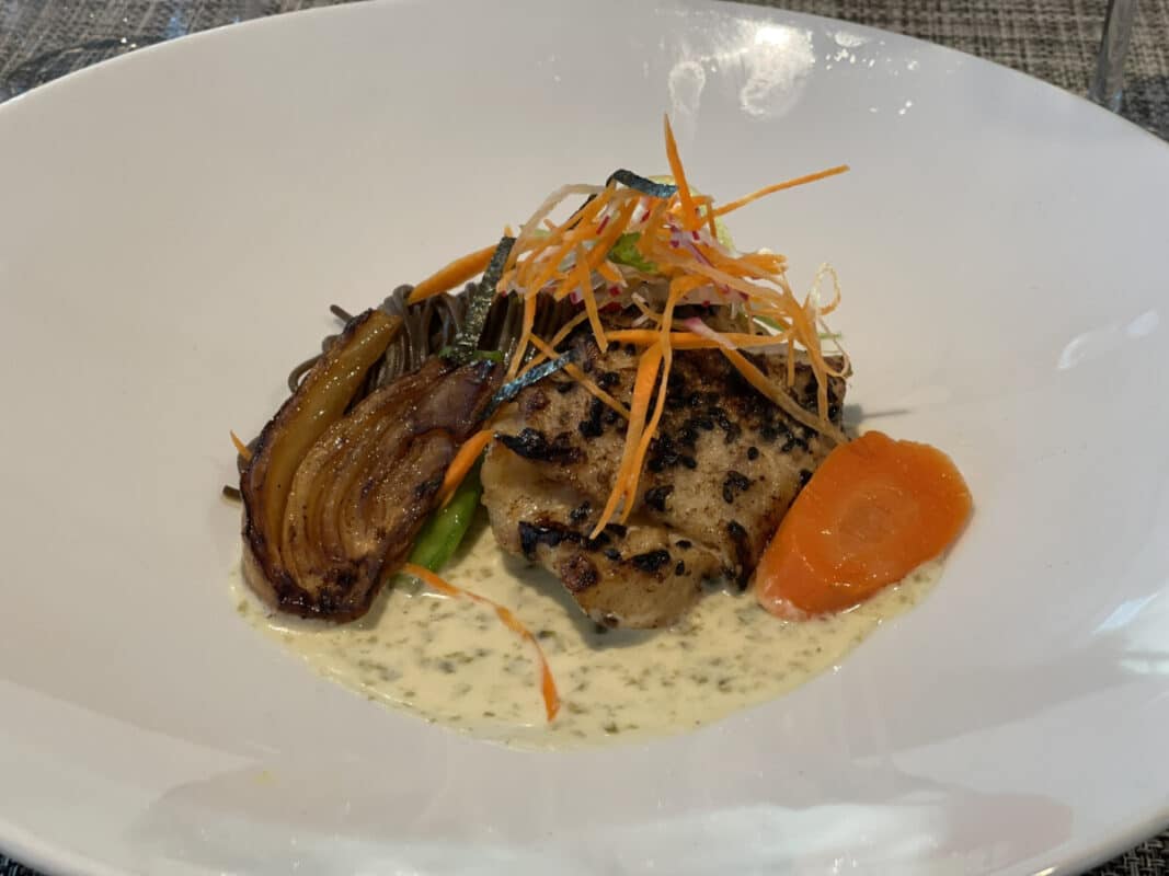 Our first dinner featured marinated herring, forest mushroom tart, pork filet wrapped in bacon and prunes, and sesame-crusted haddock fish, all expertly prepared by the ship's talented chefs. Photo by Dynie Sanderson