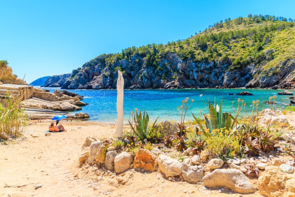 7 of the Best Secret Ibiza Beaches 6 Cala d'en Serra Beach on Ibiza Island, Spain. Photo by pkazmierczak via iStock by Getty Images