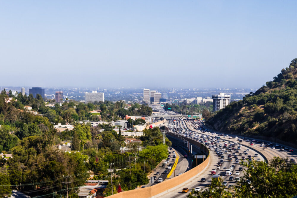 Exploring Los Angeles: What to Expect When Visiting the City of Angels 2 View toward West Los Angeles on a hazy day; heavy traffic on highway 405; California