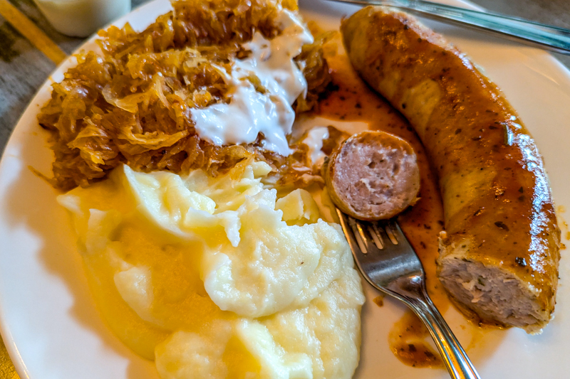Sausage, sour kraut and pureed potatoes.