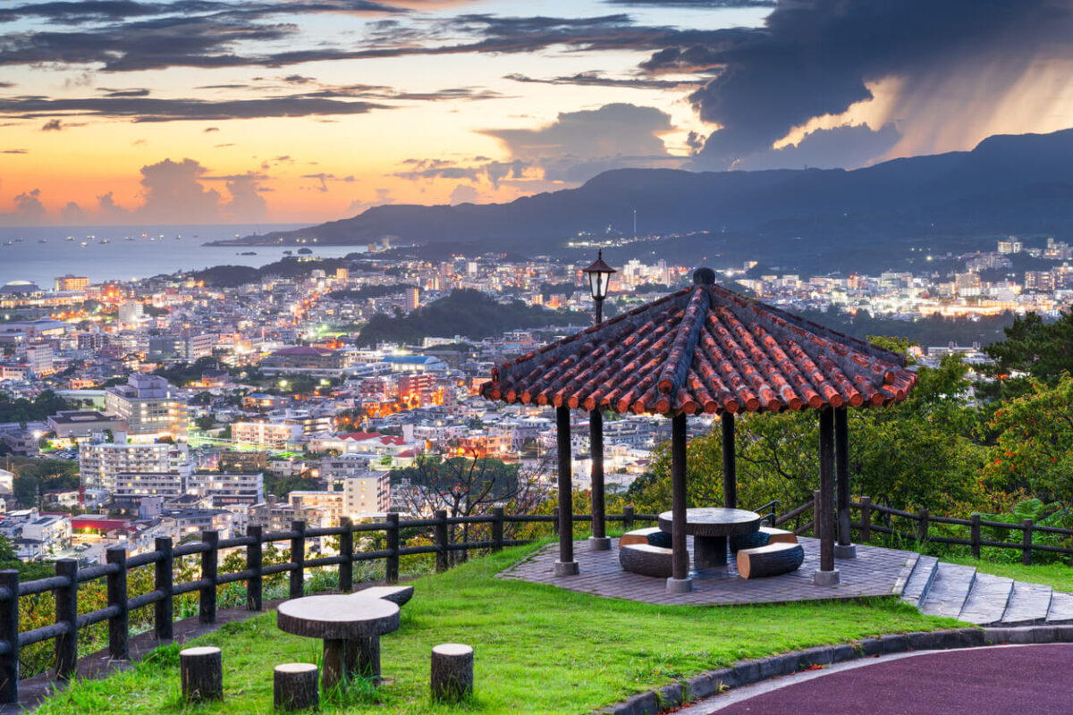 Nago, Okinawa, Japan downtown cityscape at twilight from the park.