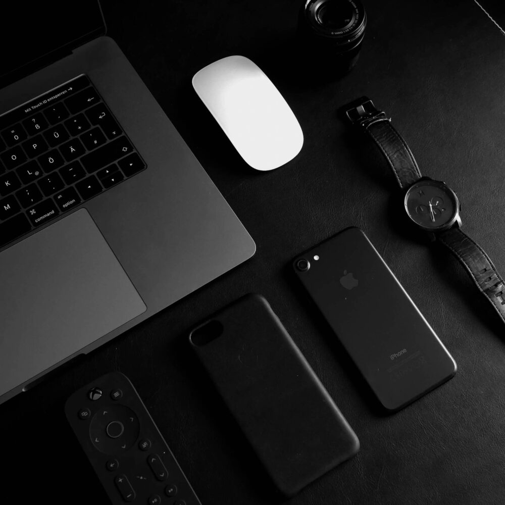 computer and phone in all black