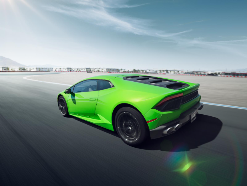 green Lamborghini on a racetrack