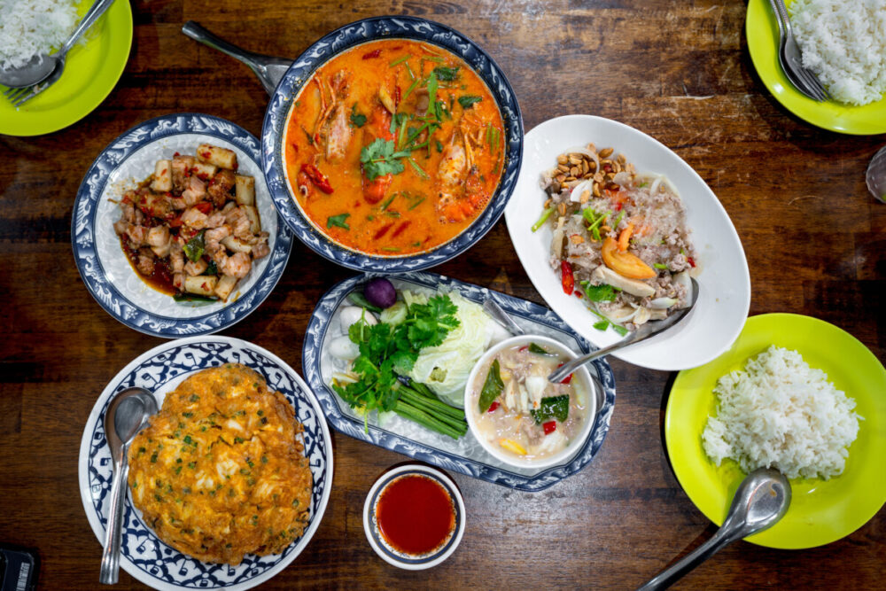 Some of the Best Worldwide Destinations For Food Lovers 5 Various of Thai food on wood table. Top view