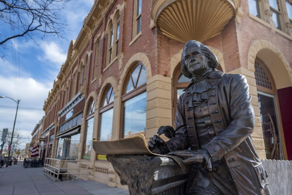 Black Hills, South Dakota Summer Travel Guide: Best Things to Do and Where to Go 32 Presidential statue on a street corner in Rapid City, SD