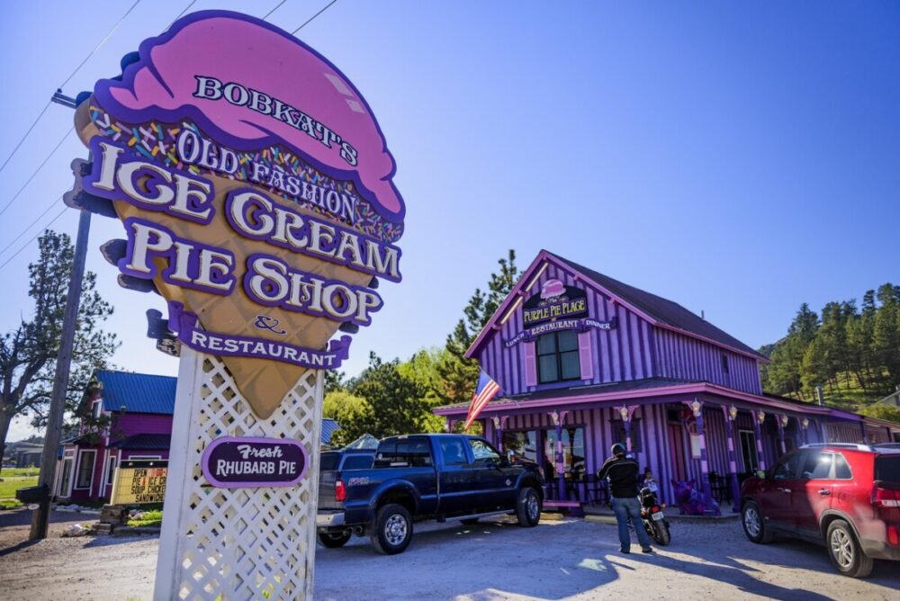 Black Hills, South Dakota Summer Travel Guide: Best Things to Do and Where to Go 30 Purple Pie Place with sign and building in the background