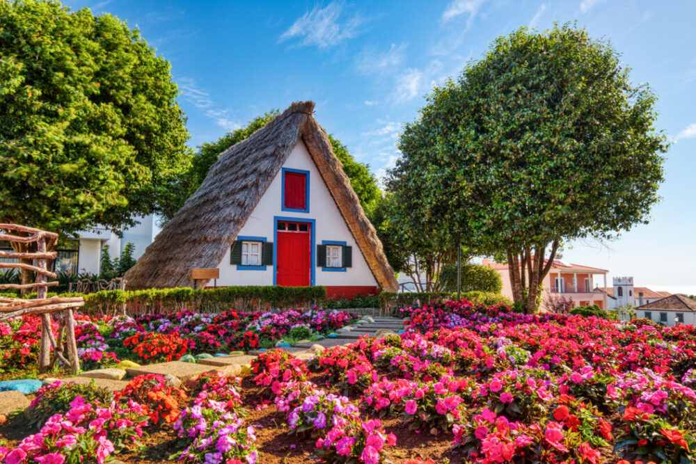 Driving Madeira: The Ultimate Scenic Road Trip Through Portugal's Island Paradise 6 Traditional Houses on Madeira during a Sunny Day