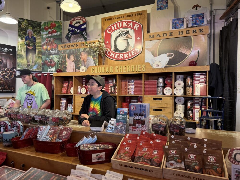 A Seattle Food Itinerary: 2 Days of Pike Place Market, Seafood, and Wine 6 Chukar Cherries both with two people behind the counter