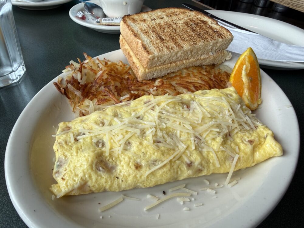 A Seattle Food Itinerary: 2 Days of Pike Place Market, Seafood, and Wine 17 Dungeness crab omelet and hash browns at Lowell's in Pike Place Market