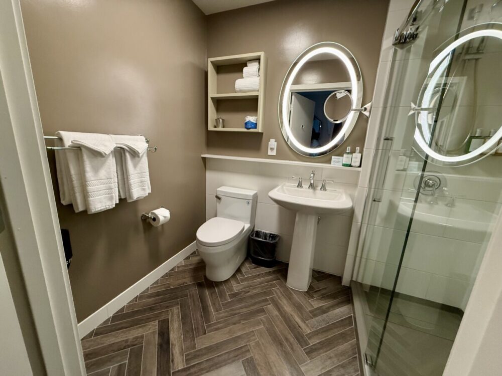 Mediterranean Inn Seattle: A Comfortable Stay in Queen Anne 3 bathroom with toilet, sink, shower