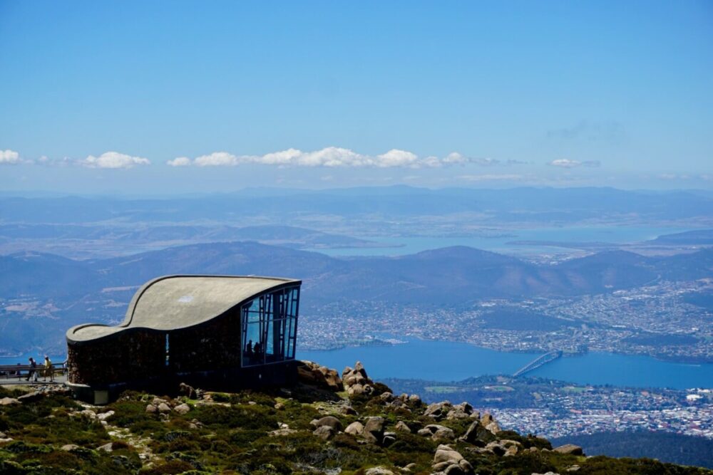 Hobart Food Guide: 10 Things to Eat, Drink, and Do in Tasmania 2 building sitting on top of a mountain in wellington park overlooking Hobart
