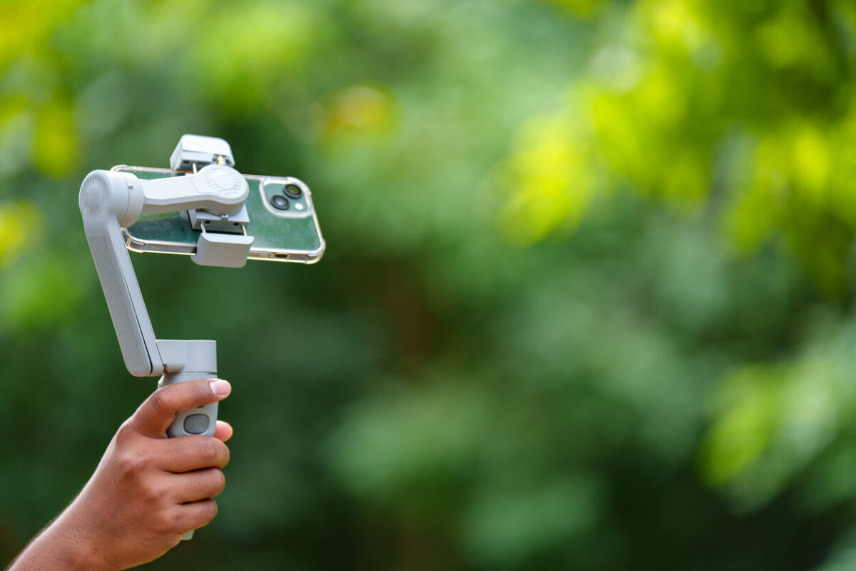 Smartphone ready for vlogging with a phone gimbal for making a mobile travel video