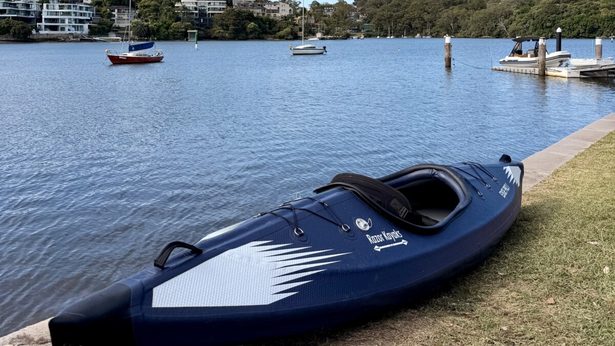 Razor Kayaks Edge Pro 1 sitting at the edge of a lake
