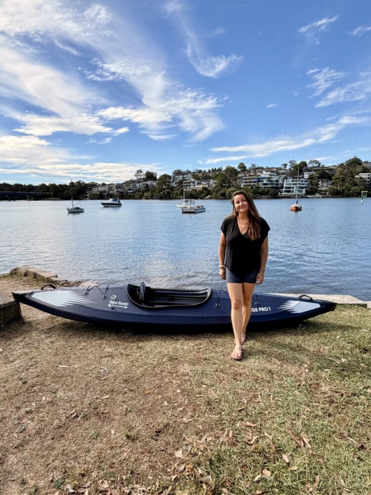 Razor Kayaks Edge Pro 1 Tried and Tested 1 caucasian woman standing next to an inflatable kayak