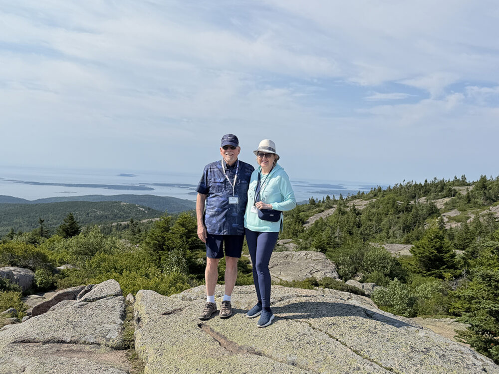 Explore Maine's Coast and Harbors Aboard American Cruise Lines 28 Us at top of Cadillac Mountain, Acadia National Park