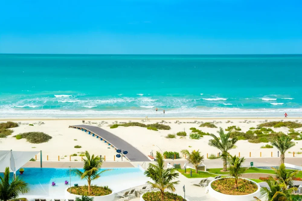 8 Helpful Resources for Planning a Saadiyat Island Trip 2 Beautiful landscape of clear turquoise ocean and sandy beach in Saadiyat island,