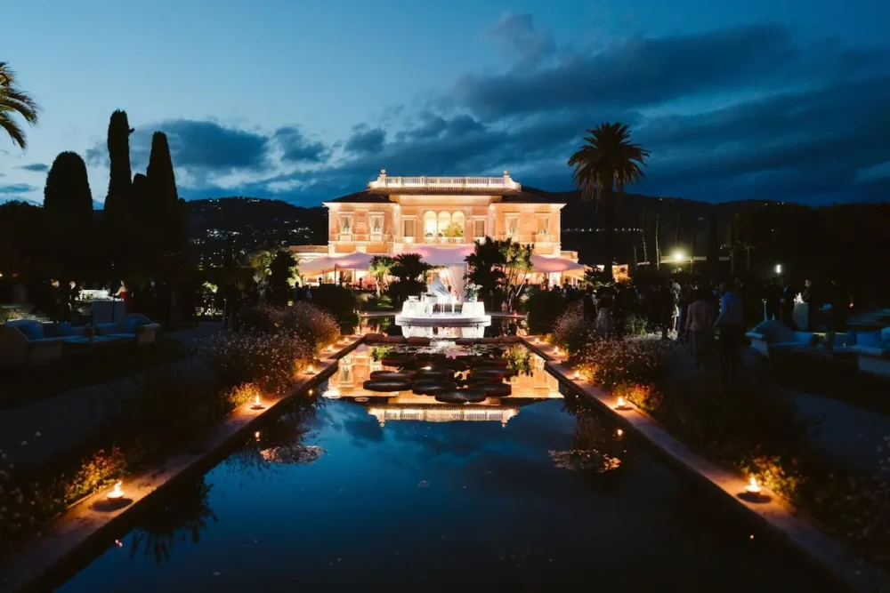 A Dream Wedding at Villa Ephrussi de Rothschild on the French Riviera 5 Villa Ephrussi de Rothschild illuminated during an evening wedding celebration