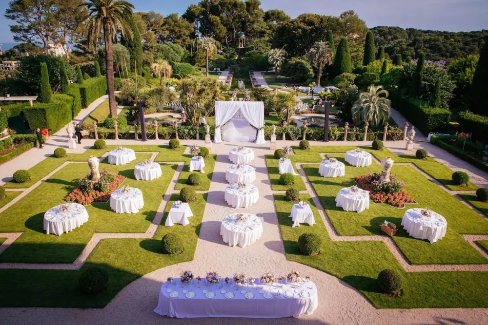 A Dream Wedding at Villa Ephrussi de Rothschild on the French Riviera 4 Reception tables set in the gardens of Villa Ephrussi de Rothschild wedding