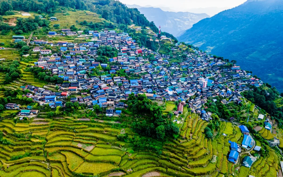 Nepal's Cliff Honey Harvest: The Ladder at Bhujung 1 Aerial view of Bhujung village at Lamjung, Nepal.