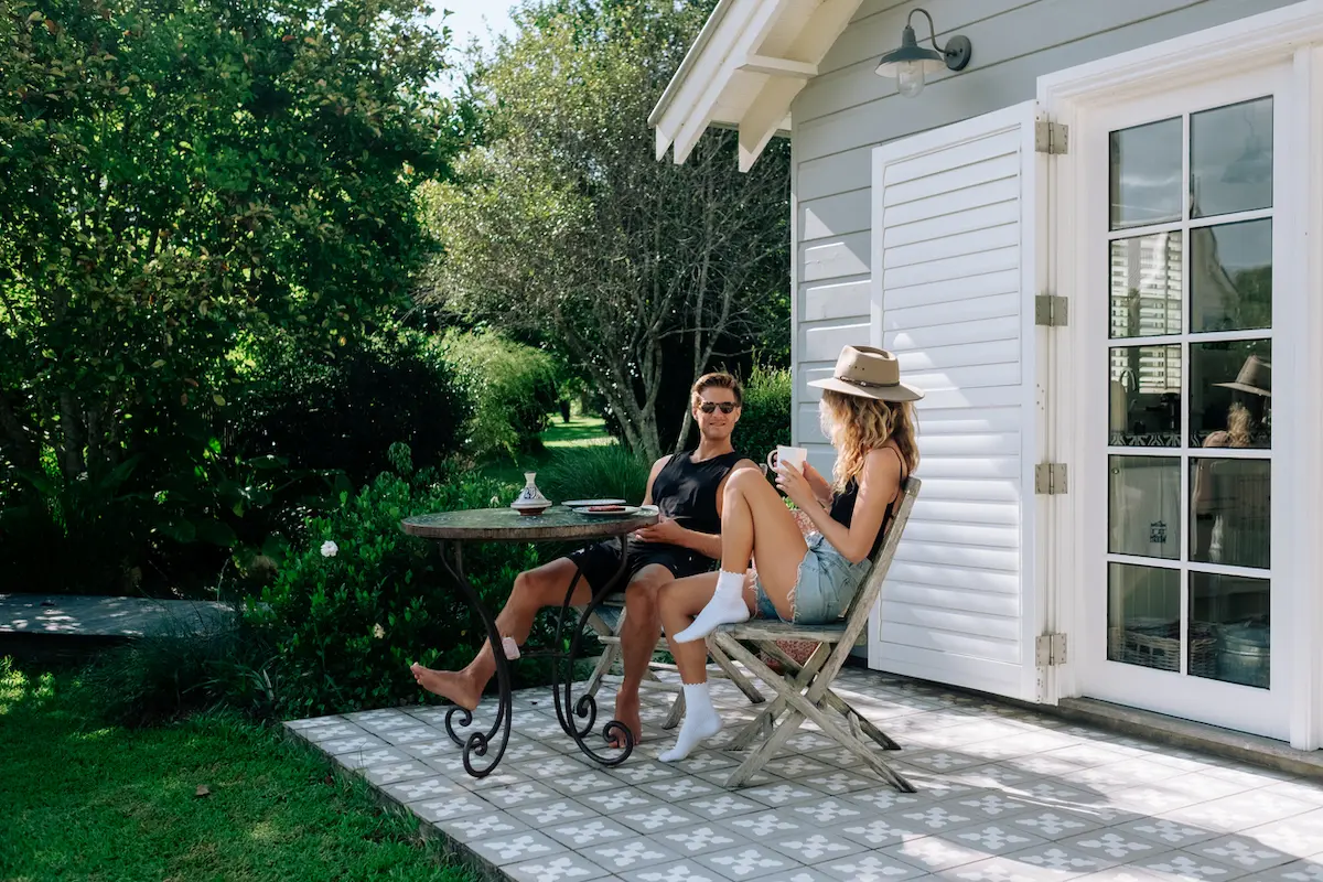 Moving to Australia With Your Partner: What You Need to Know 1 A couple enjoying breakfast on their patio in Australia